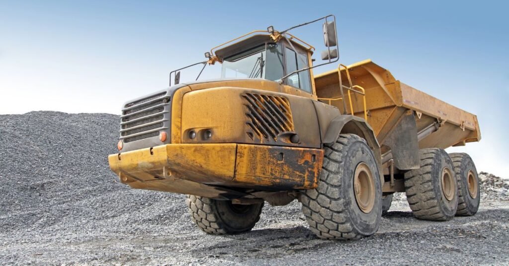 Image of Dump Trucks for Demolition: Standard & Articulated Models.